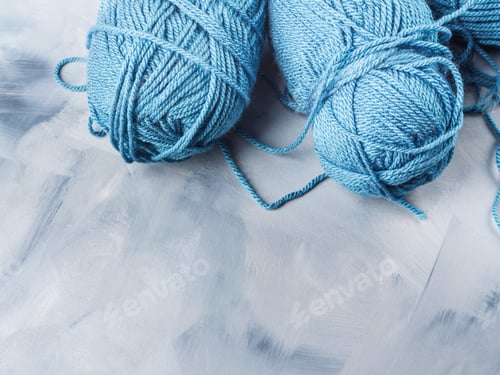 Preview: Blue Yarn Balls on Textured Grey Background