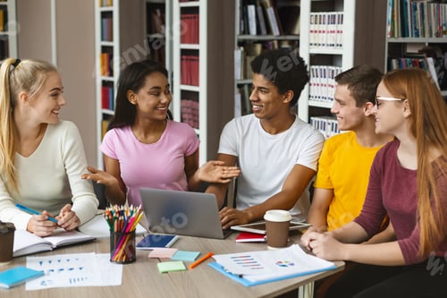 Preview: Friends discussing homework, studying at library together