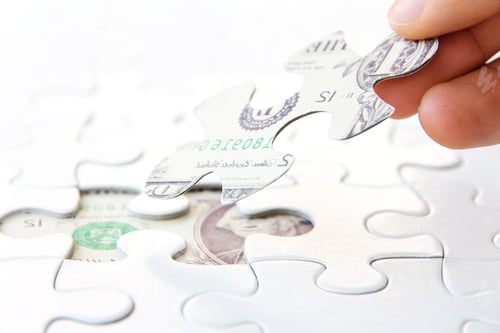 Preview: Hand holding a puzzle piece, Finance concept