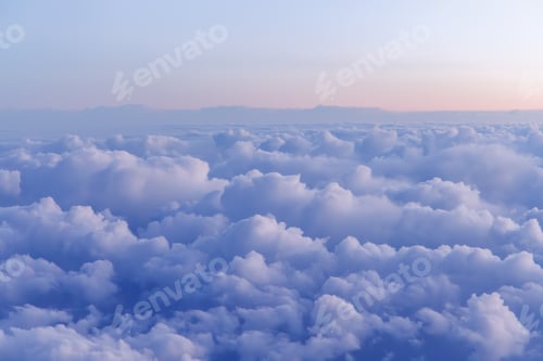 Preview: Sunset above the clouds from airplane