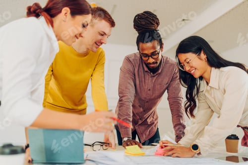 Preview: Multiracial team of engineers or architects having a meeting in an office