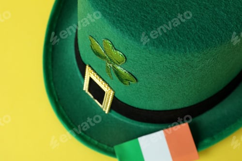 Preview: Concept of St.Patrick's Day on yellow background, close up