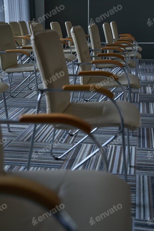 Preview: Line of chairs staying in airport lounge