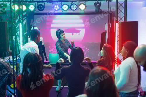 Preview: Energetic performer using dj station