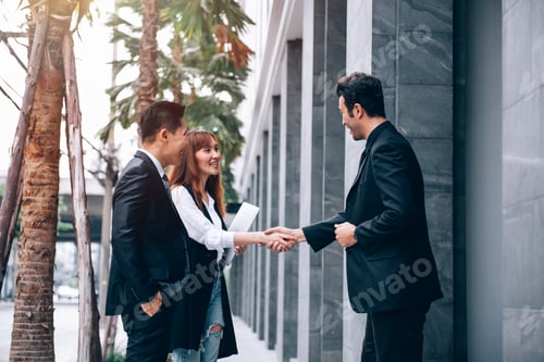 Preview: Group of Asian Business People in Business District Talking about New Business.
