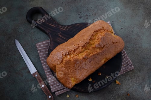 Preview: Homemade freshly baked cupcake lies on a cutting board.Selective focus.