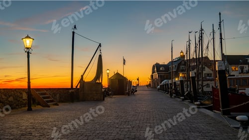 Preview: Urk Flevoland Netherlands sunset at the lighthouse and harbor of Urk Holland