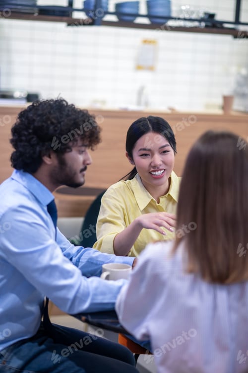Preview: Team working on the project and looking involved