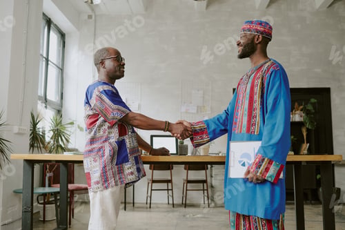Preview: African American Coworkers Giving Handshake