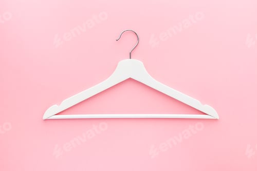 Preview: White hangers on pastel pink background
