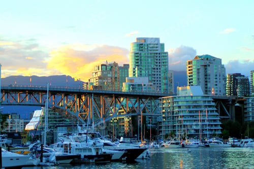 Preview: Golden hour in a city harbor.