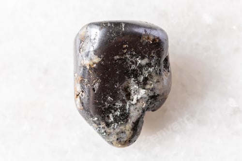 Preview: polished cleiophane and mushketovite rock on white