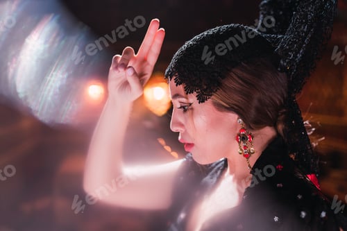 Preview: Woman in dress with upped hand dancing on scene