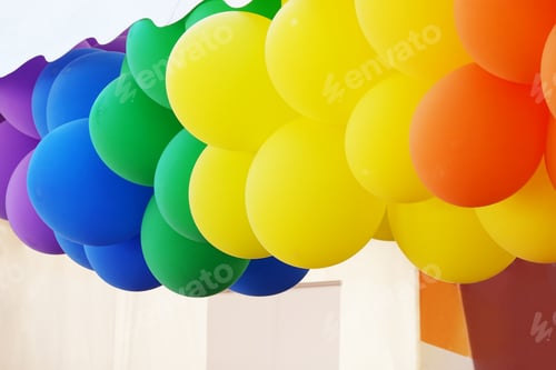 Preview: balloons in the colors of the rainbow flag at gay pride month party
