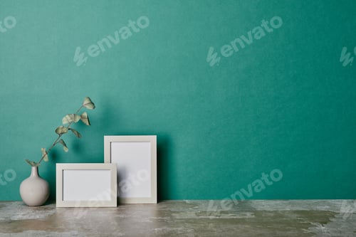 Preview: Vase with flower and photo frames on green background