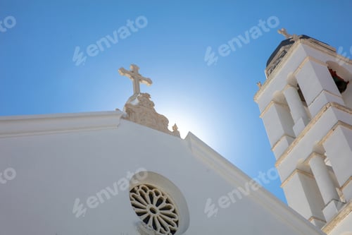 Preview: Greece, Tinos island, Chora Cyclades. Panagia Megalohari Orthodox Church Cross, Belfry. Under view