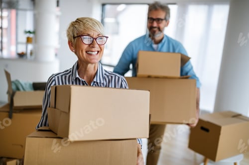 Preview: Portrait of happy senior couple in love moving in new home