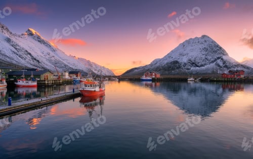Preview: Red fishing boats on the sea, snowy mountains at colorful sunset