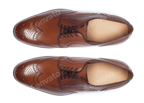 Preview: Classic male leather shoes isolated on a white, top view