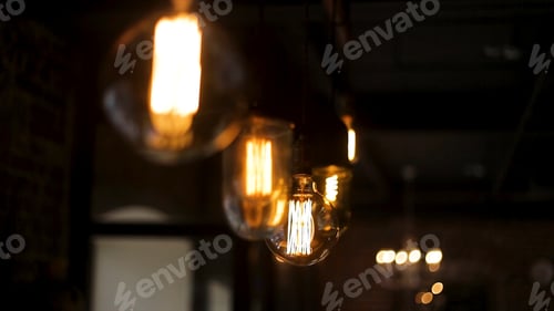 Preview: Vintage style light bulbs hang and decorated in a living room. Retro luxury light lamp decor glowing