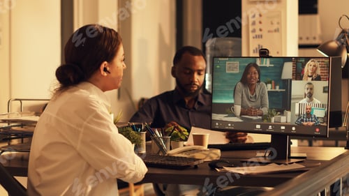 Preview: Young adult attending videocall company meeting
