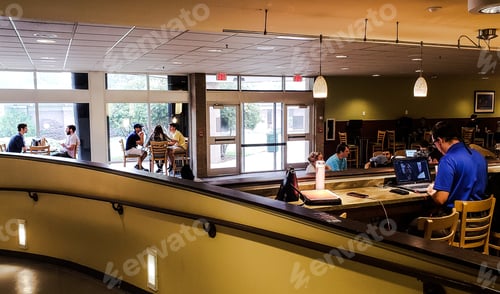 Preview: College students in computer lab and study hall on laptops and technology back to school.