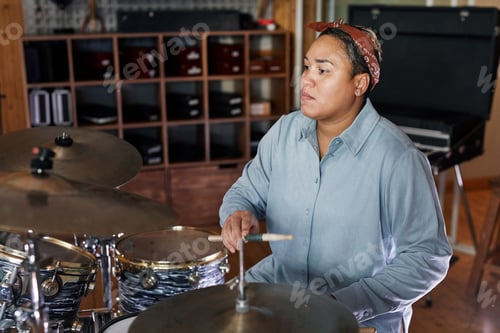 Preview: Female Drummer at Rehearsal