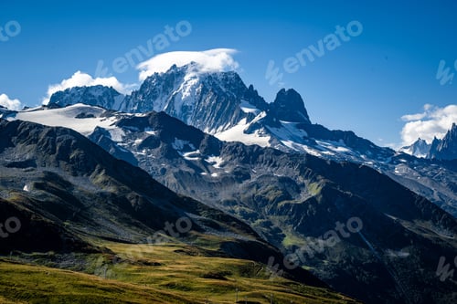 Preview: View of the mountains in Alps on a sunny day