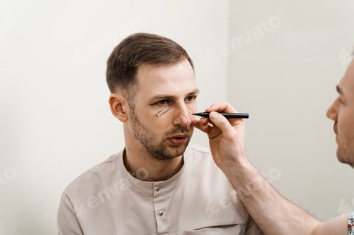 Preview: Male cosmetic surgery markings for rhinoplasty and blepharoplasty procedure