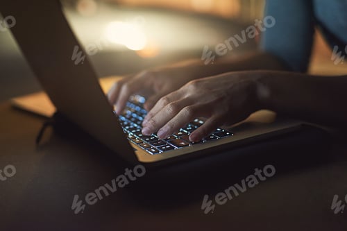 Preview: Working through the night. Closeup shot of a woman working late on a laptop.