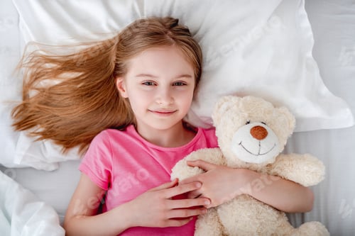 Preview: Girl in the bed with teddy bear