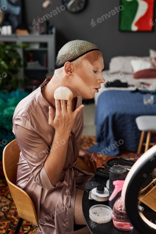 Preview: Profile View Doing Makeup in Messy Hotel Room