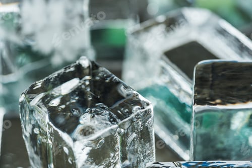 Preview: close up view of melting transparent clear square ice cubes