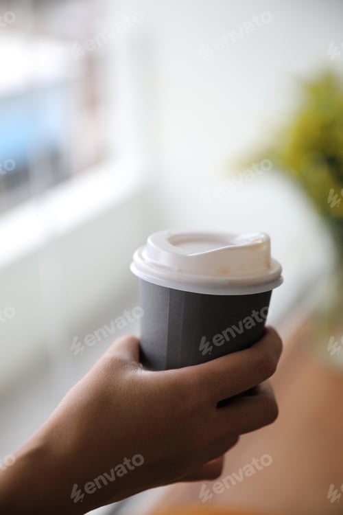 Preview: Take Home Hot Cappuccino Or Latte Art Coffee Made From Milk With Female Hand