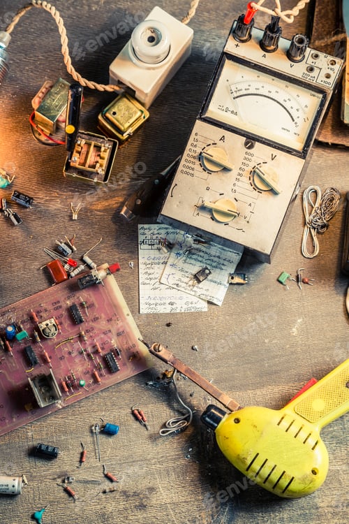 Preview: Vintage electronics workplace in school lab on old wooden table