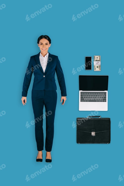 Preview: top view of businesswoman with laptop, briefcase, money and smartphone isolated on blue background