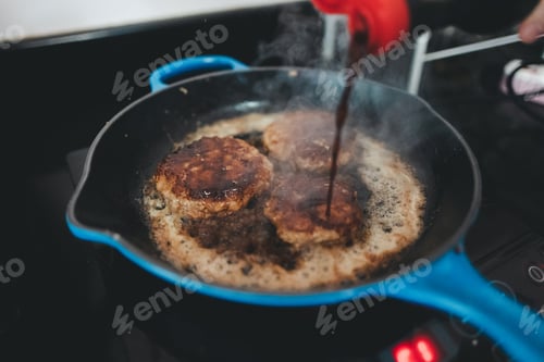 Preview: Burger preparation on the hot pan