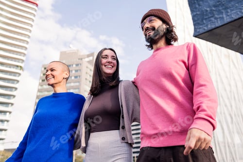 Preview: three friends laughing and hugging during a stroll