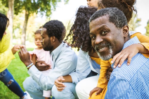 Preview: Beautiful happy african american family bonding at the park