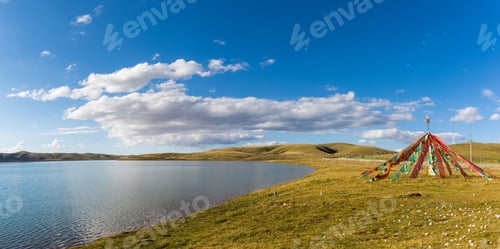 Preview: plateau sacred lake and bright flapping prayer flags