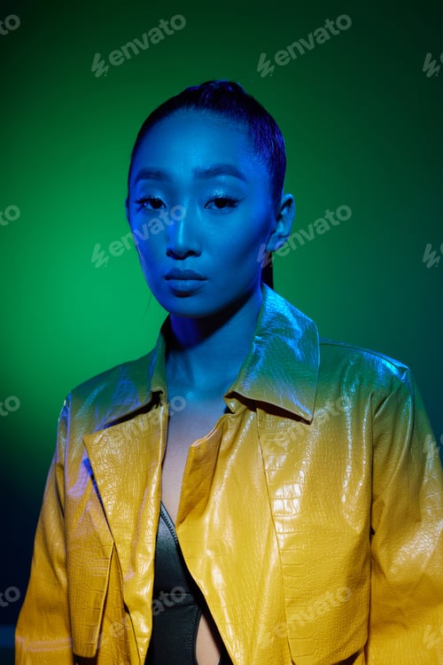 Preview: Woman trendy female disco colorful fashion neon art yellow beauty light high skin green