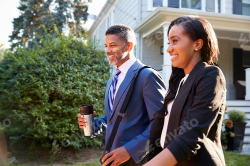Preview: Business Couple Leaving Suburban House For Commute To Work