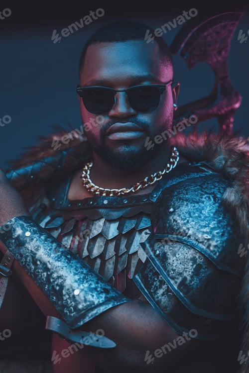 Preview: African man with sunglasses holding axe on his shoulder