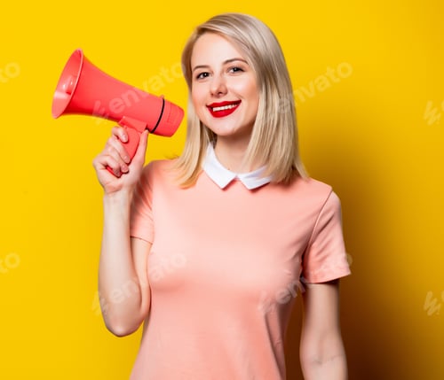 Preview: Blonde girl in pink dress with megaphone