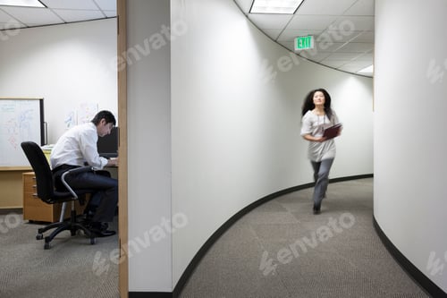 Preview: Asian businessman working alone in his office