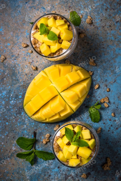 Preview: Parfait with yogurt, mango and granola top view
