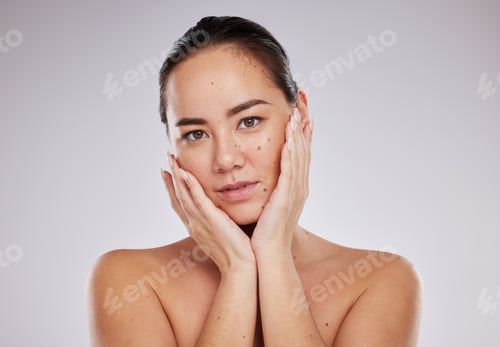 Preview: Face portrait, skincare beauty and woman in studio isolated on a gray background. Makeup, natural c