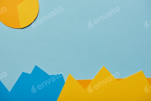 Preview: top view of blue textured background with paper charts and graphs
