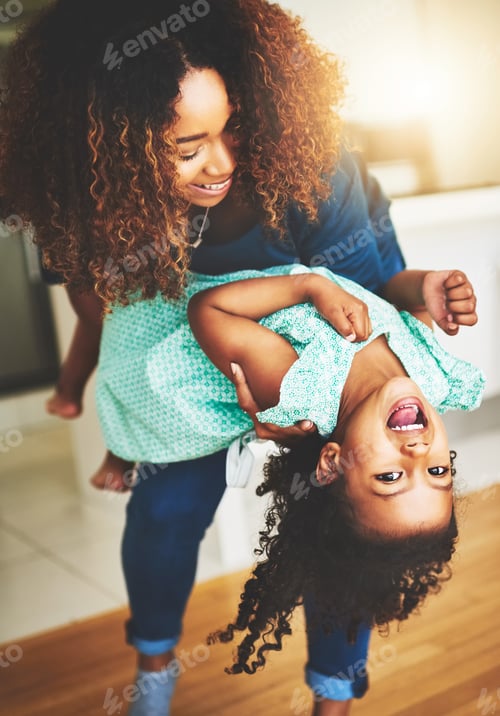 Preview: I just cant get enough of her. Shot of a little girl and her mother dancing at home.