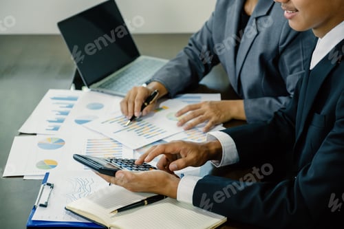 Preview: businessmen and businesswomen team meeting to plan strategies to increase business income